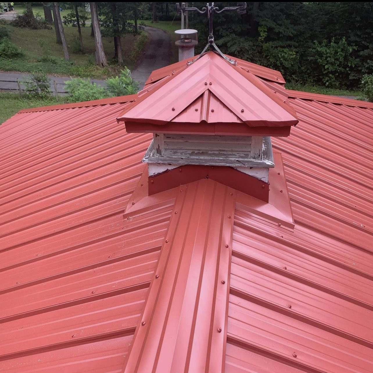Exposed fastener metal roof installed by Michigan Metal Roofing