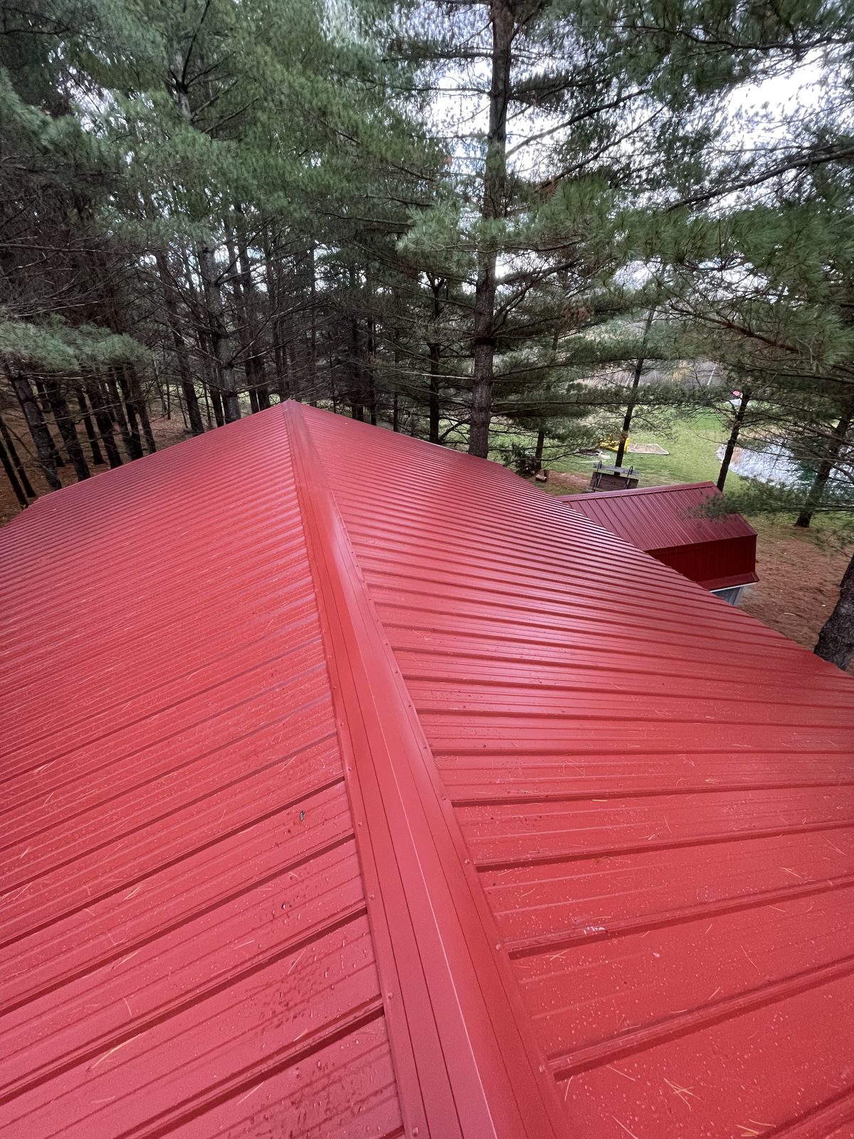 Exposed fastener metal roof installed by Michigan Metal Roofing