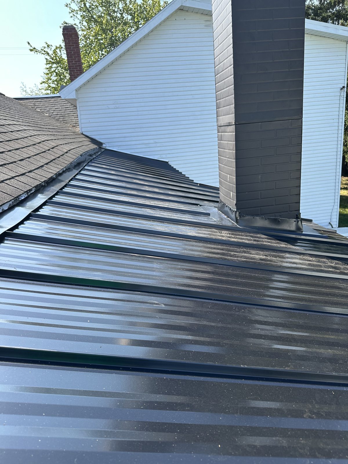 Standing seam metal roof installed by Michigan Metal Roofing