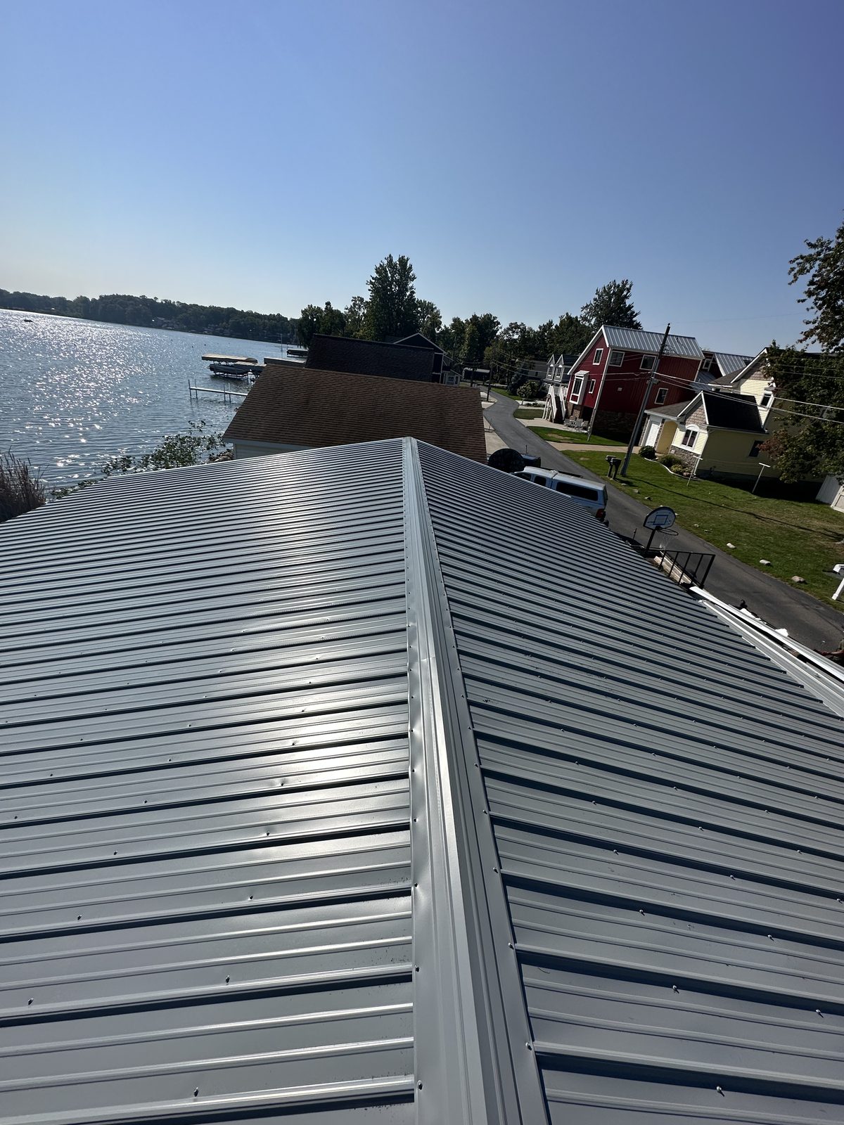 Exposed fastener metal roof installed by Michigan Metal Roofing