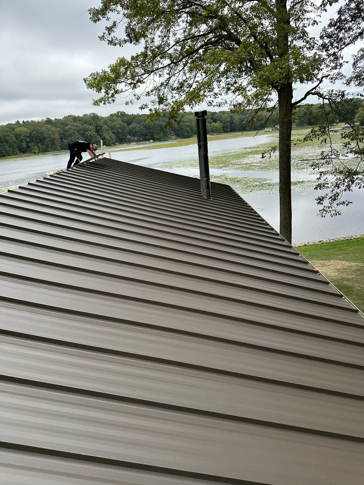 Standing seam metal roof installed by Michigan Metal Roofing
