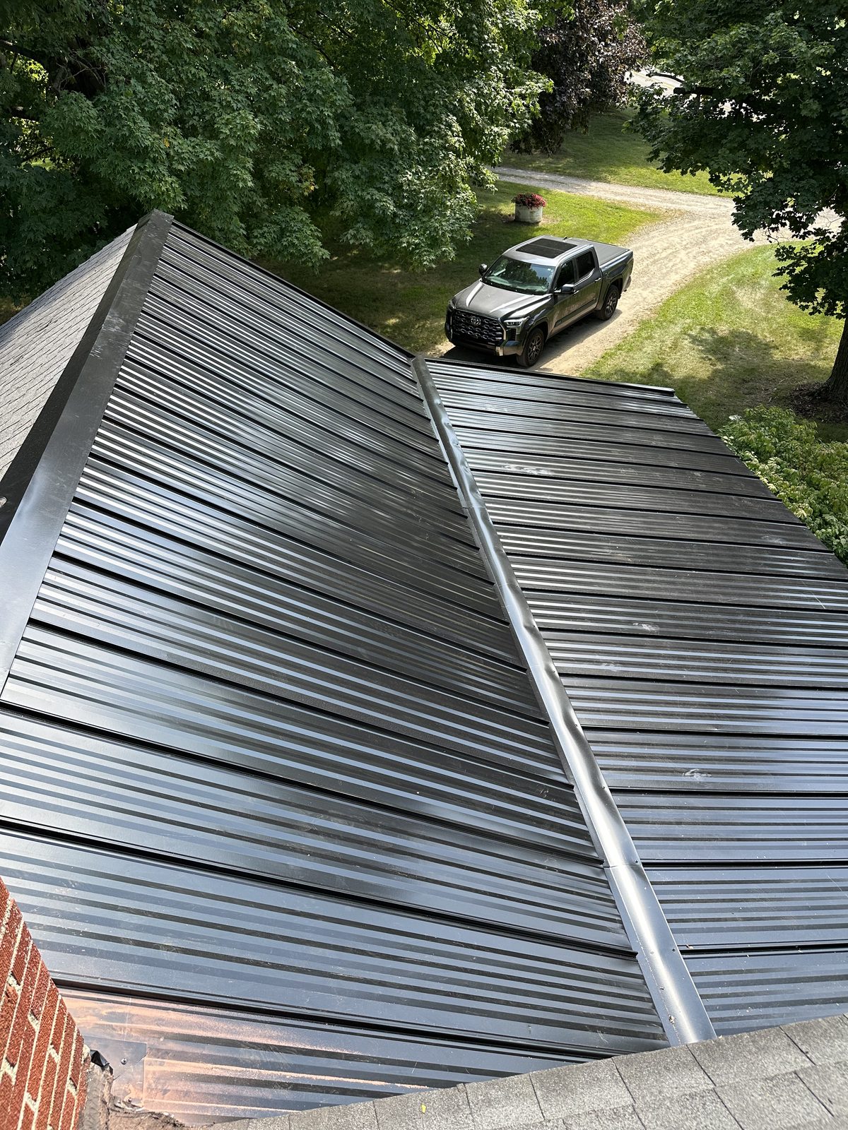 Standing seam metal roof installed by Michigan Metal Roofing