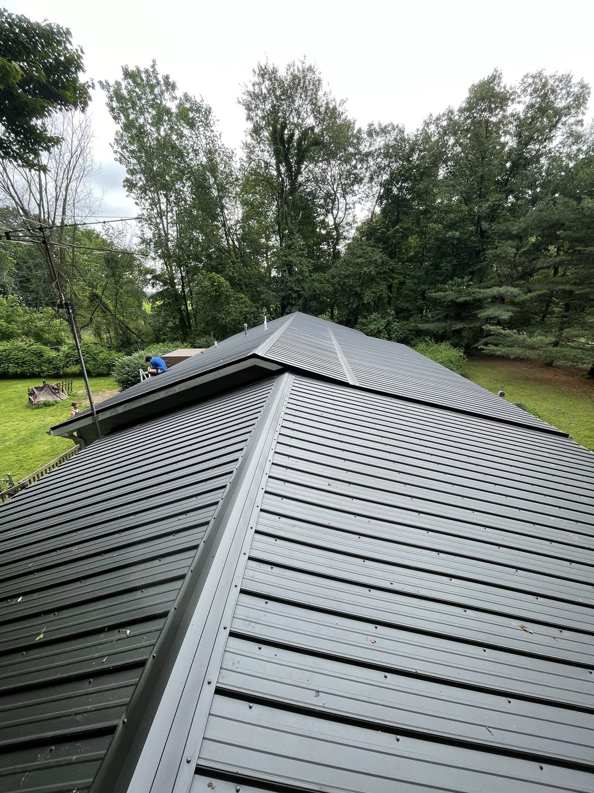 Exposed fastener metal roof installed by Michigan Metal Roofing