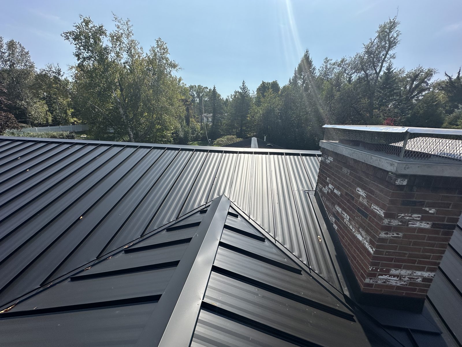 Standing seam metal roof installed by Michigan Metal Roofing