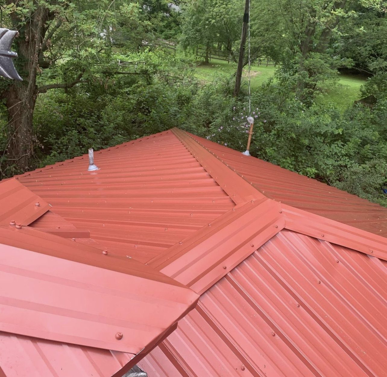 Exposed fastener metal roof installed by Michigan Metal Roofing