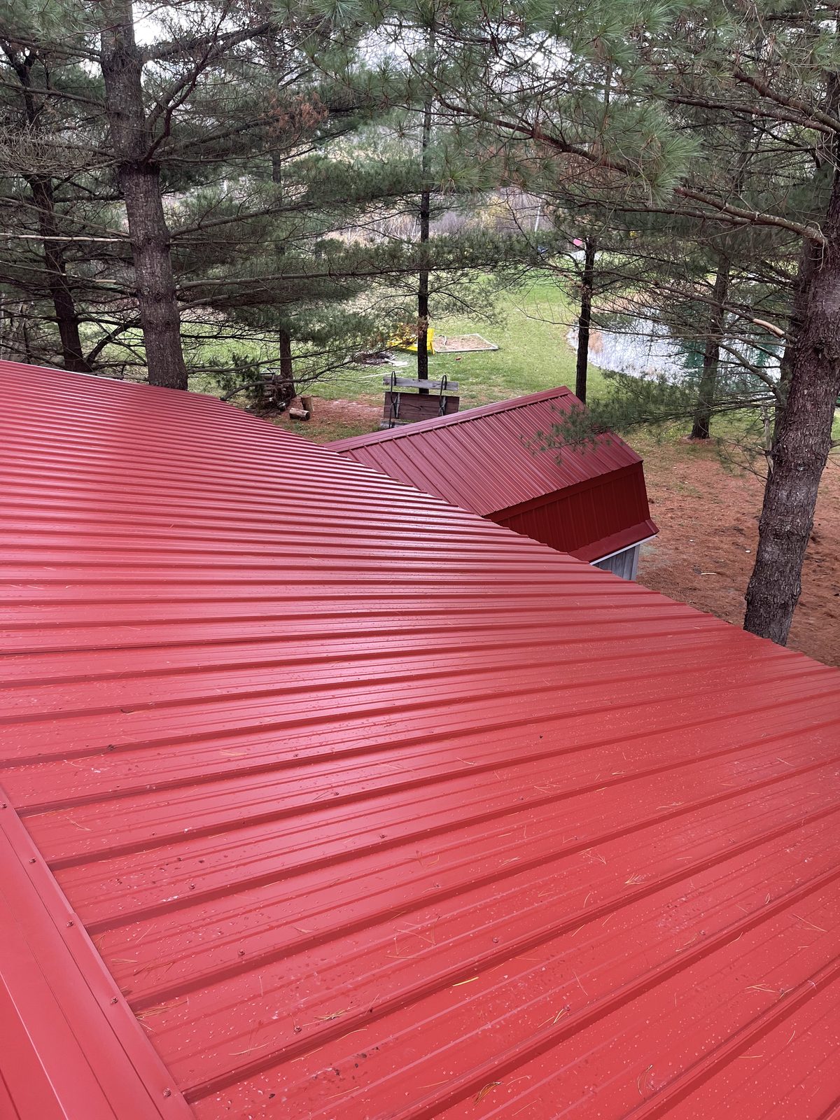 Exposed fastener metal roof installed by Michigan Metal Roofing