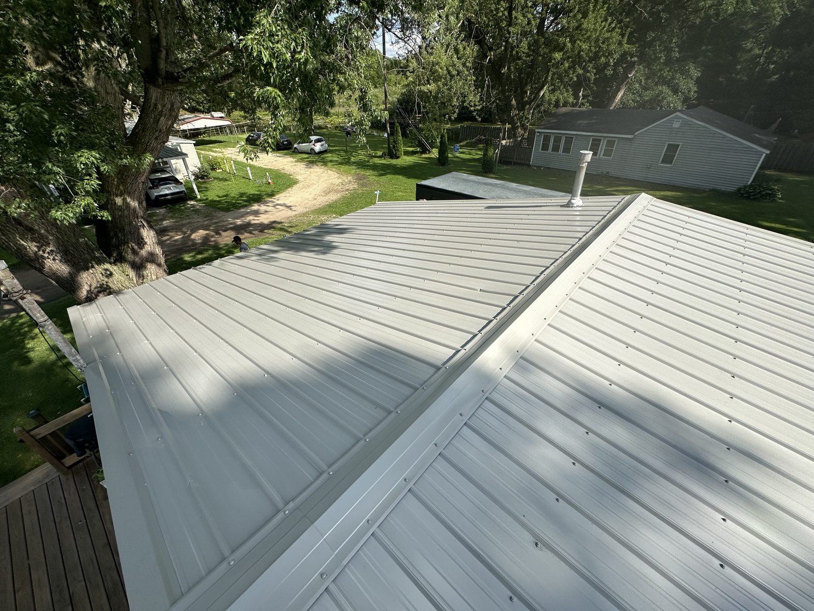Exposed fastener metal roof installed by Michigan Metal Roofing