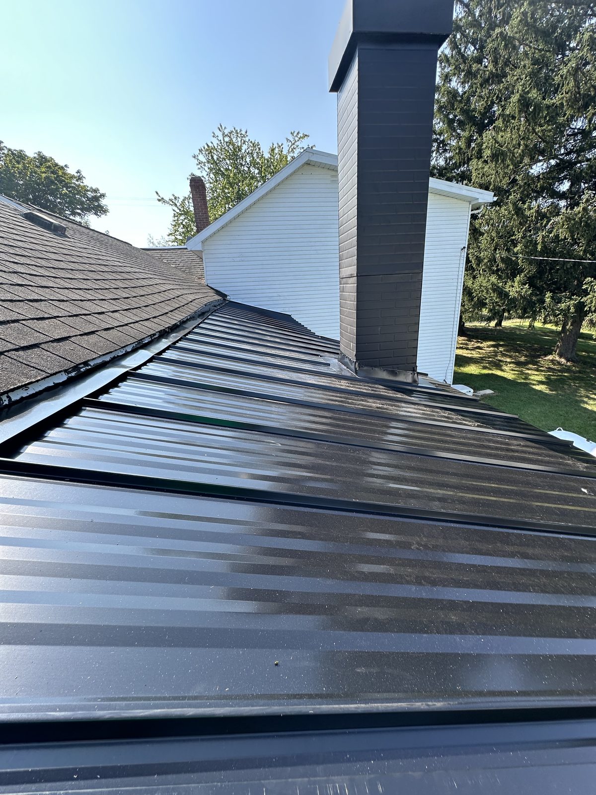Standing seam metal roof installed by Michigan Metal Roofing