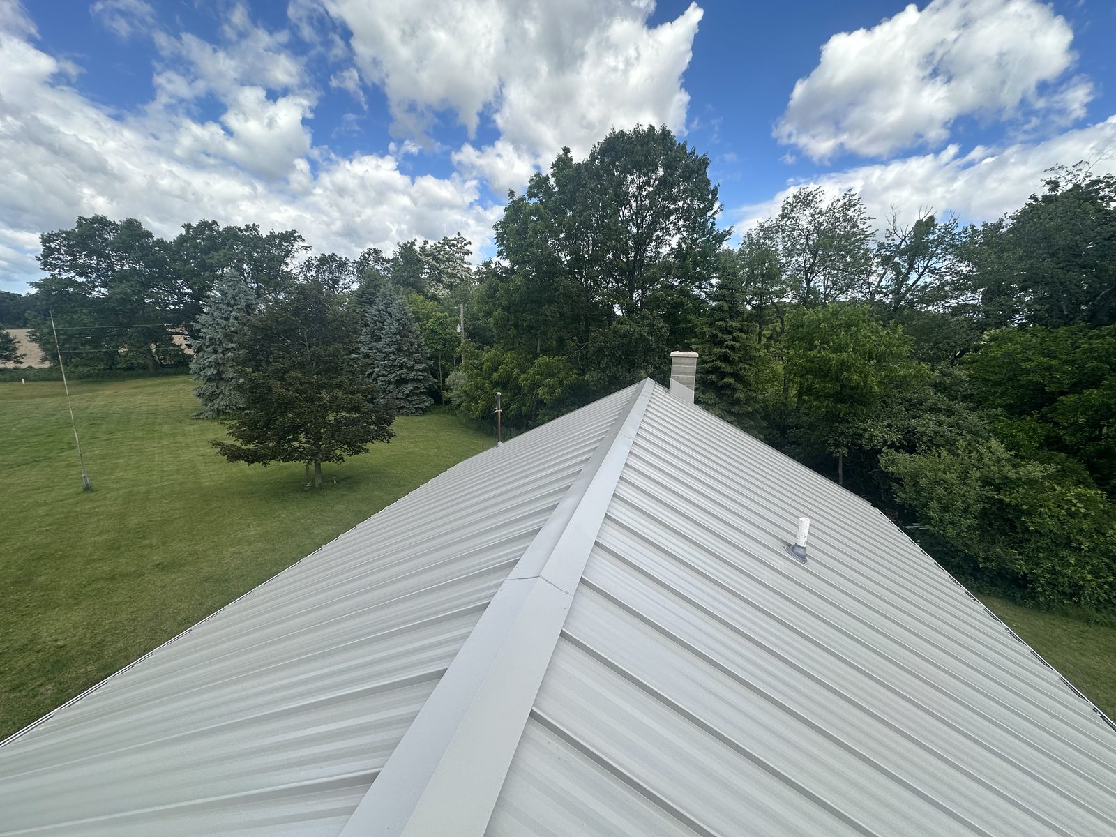 Standing seam metal roof installed by Michigan Metal Roofing