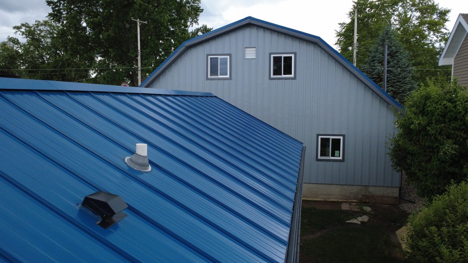 Standing seam metal roof installed by Michigan Metal Roofing