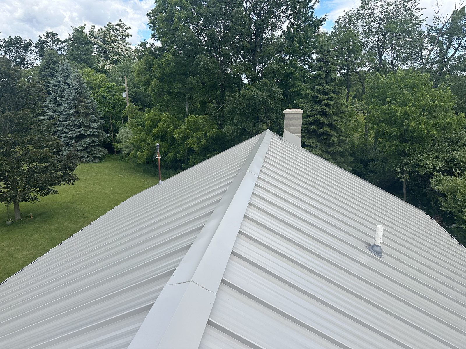 Standing seam metal roof installed by Michigan Metal Roofing