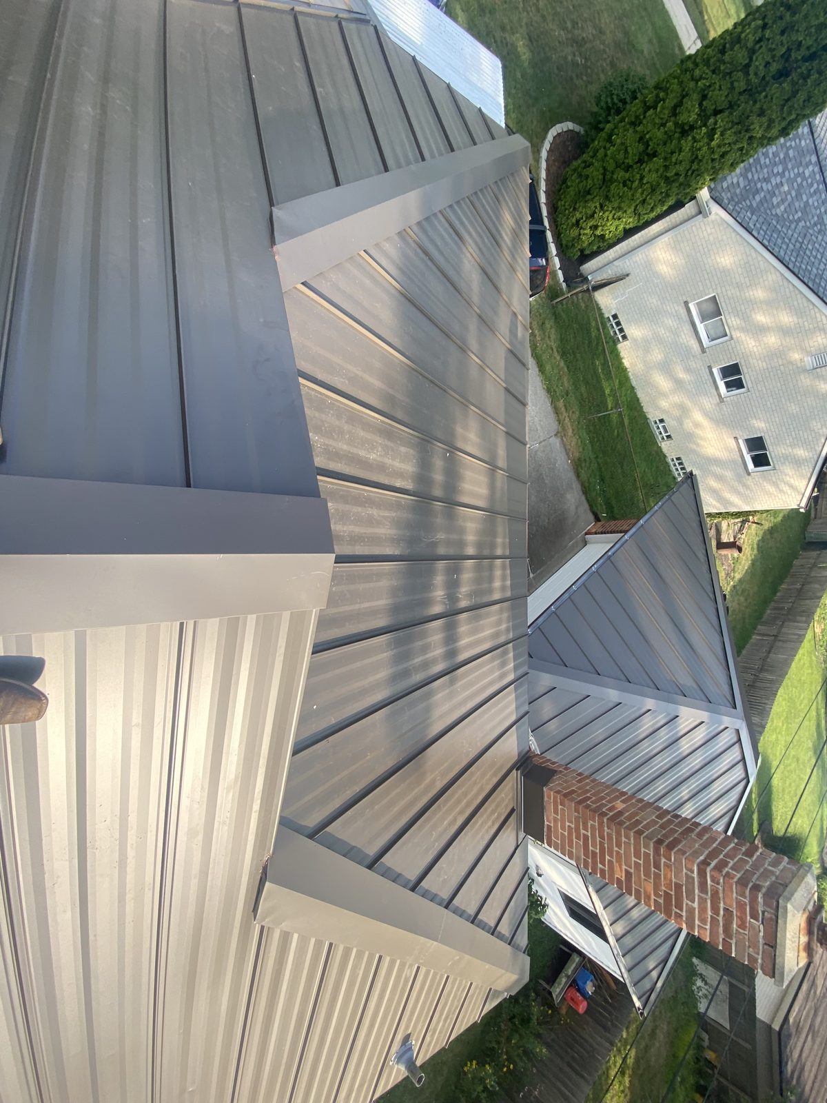 Standing seam metal roof installed by Michigan Metal Roofing