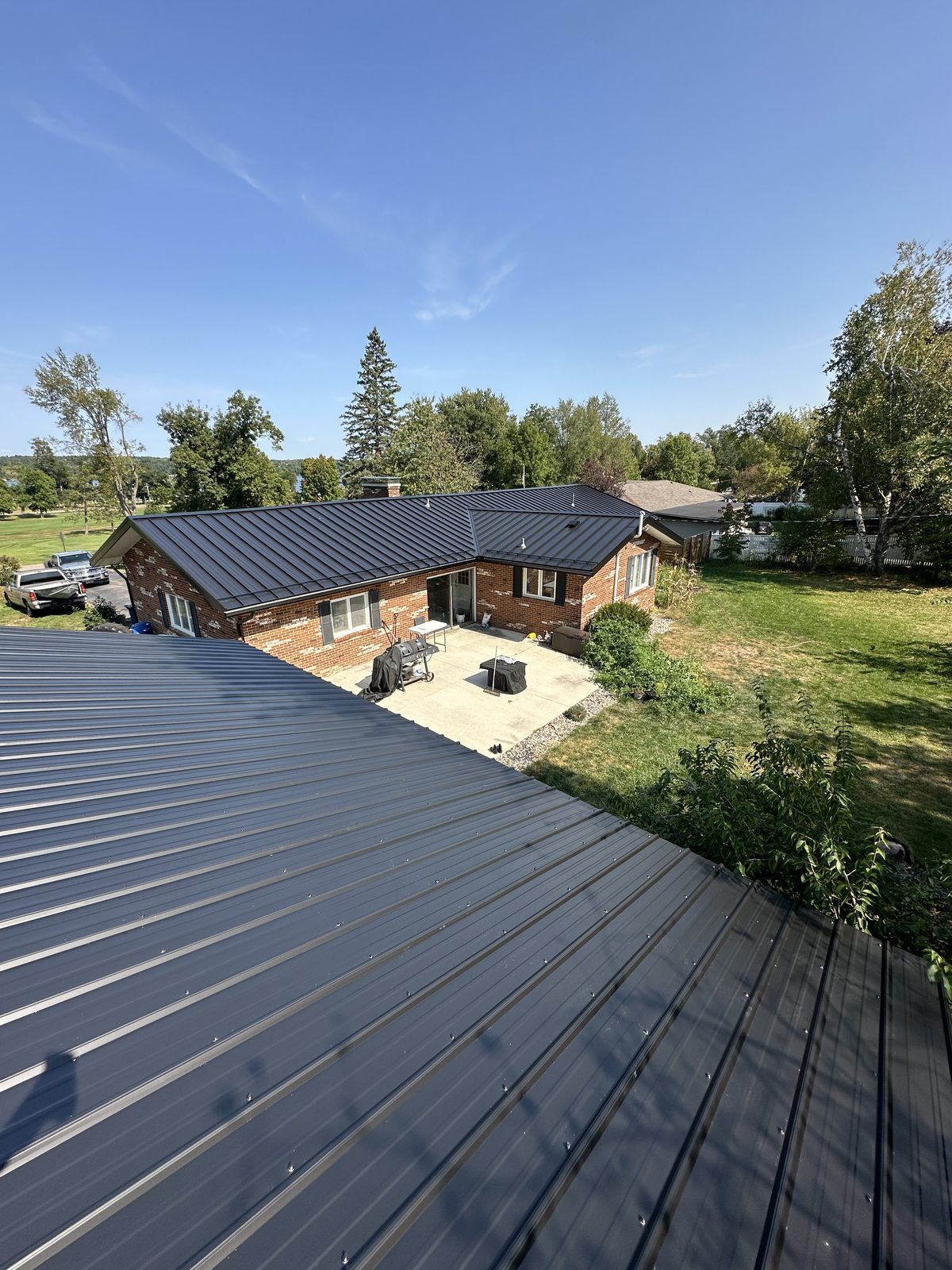 Standing seam metal roof installed by Michigan Metal Roofing