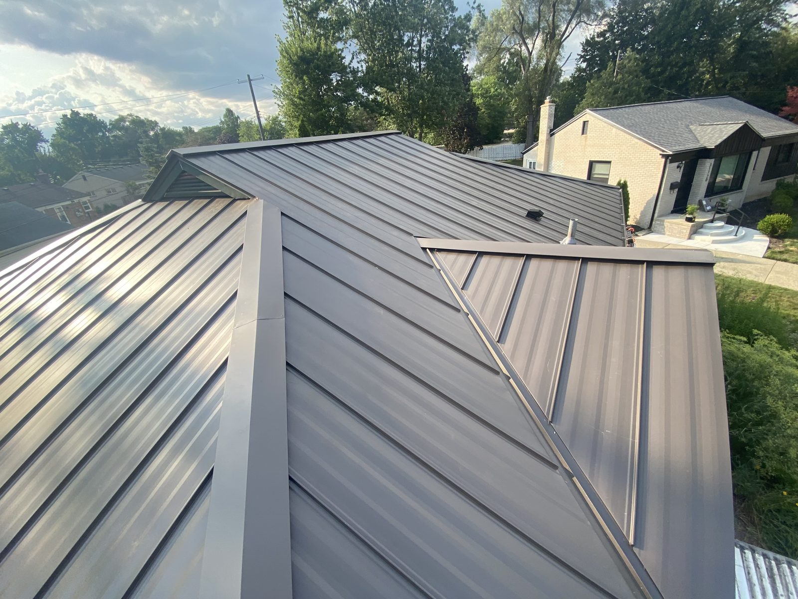 Standing seam metal roof installed by Michigan Metal Roofing