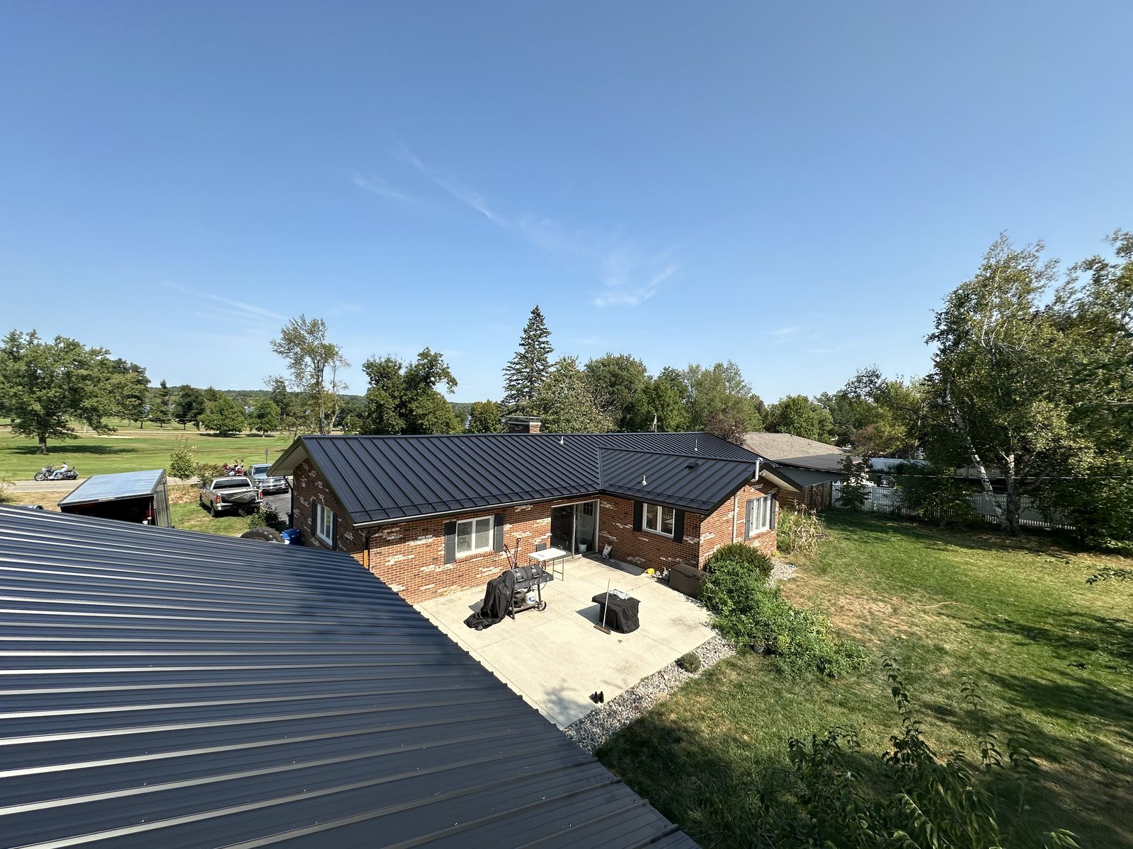 Standing seam metal roof installed by Michigan Metal Roofing